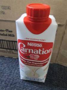 lot 40 image: 8- 11 oz Carnation Lactose Free Eva...