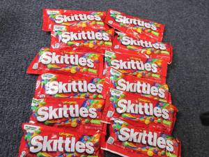 lot 69 image: 12- 2.17 oz Skittles...
