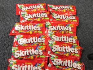 lot 70 image: 12- 2.17 oz Skittles...
