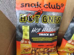 lot 124 image: 12- 2 oz Snak Club Hot Ones Hot Hab...