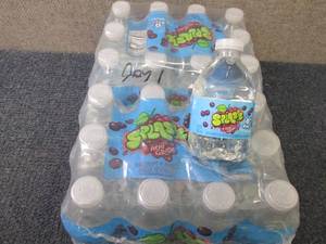 lot 140 image: 24- 8 oz Splash Acai Grape...