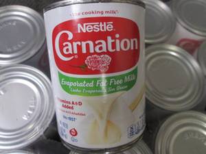 lot 176 image: 12- 12 oz Carnation Fat Free Evapor...
