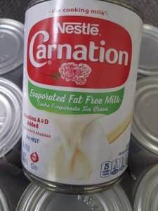 lot 177 image: 12- 12 oz Carnation Fat Free Evapor...