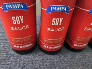 lot 209 image: 4- 10 oz Pamps Soy Sauce...