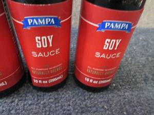 lot 210 image: 4- 10 oz Pamps Soy Sauce...