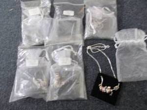 lot 298 image: 6 June Birthstone Charm Necklaces...