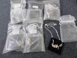 lot 299 image: 6 June Birthstone Charm Necklaces...