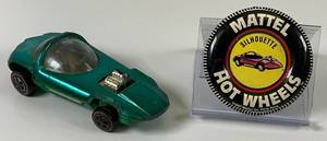 lot 23 image: RARE FACTORY ERROR 1967 REDLINE Hot Wheels Silhoutte Transparent Aqua Top Transpaernt Green Bottom  With Button Really Nice Condition (Missing Tab On Button)