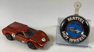 lot 28 image: 1967 REDLINE Hot Wheels Ford J Car Transparent Orange With Button Really Nice Condition