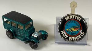 lot 48 image: 1968 REDLINE Hot Wheels Classic 31 Ford Woody Transparent Aqua With Button Really Nice Condition
