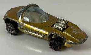 lot 66 image: 1967 REDLINE Hot Wheels Silhouette Transparent Gold Nice Condition