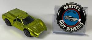 lot 95 image: 1967 REDLINE Hot Wheels Ford J Car Transparent Apple Green With Button Really Nice Condition (Tab missing On Button)