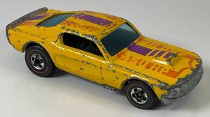 lot 182 image: 1974 REDLINE Hot Wheels Mustang Shocker Yellow Multi Color Fair Condition