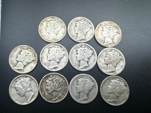 lot 67 image: Eleven Mixed Date Mercury Dimes