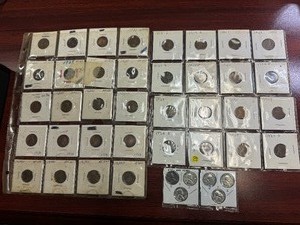 lot 83 image: Twenty Eight Carded Earlier Date Lincoln Wheat Cents and two sets of BU 1943 PDS Steel Cents (34 Coins in all)