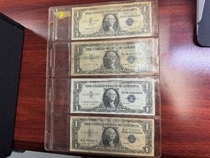 lot 97 image: Four 1957 A $1.00 Silver Certificates