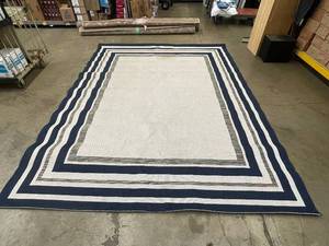 lot 23 image: Ravenna Collection Shelby Navy Ivory Multi 710 x 10 Area Rug with  light Stain