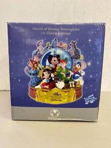 lot 27R image: World of Disney Snowglobe with Multiple Characters Collectible
