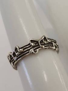 lot 63P image: Sterling Silver Musical Note Ring Band