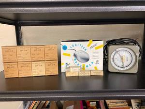 lot 21S image: Vintage Military Radio Tubes, Logitech MouseMan, Timer Lot