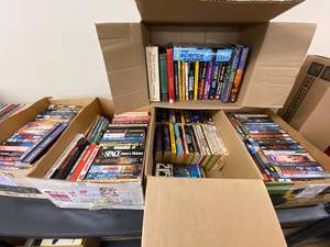 lot 57S image: Diverse Collection of Vintage and Modern Science Fiction Paperback Books