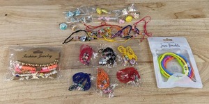 lot 130E image: Brand New Assorted Religious Jewelry includes Bracelets, Clip-On Earrings, Adjustable Rings,  and Necklaces N