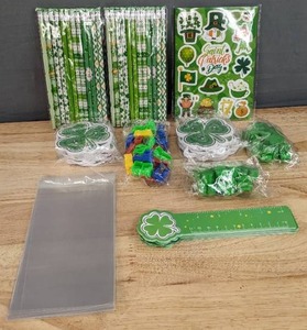 lot 99 image: Brand New St. Patrick Day Favors Including Bags Pencils, Stickers, Paper Rulers, Pencil Sharpeners, Erasers and Note Pads N