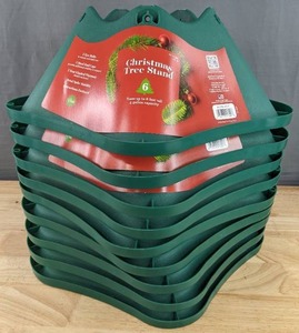 lot 85 image: Resellers Paradise 9 Brand New Oasis Christmas Tree Stands For Trees Up To 6 Feet Tall and Comes with Eye Bolts and End Caps N