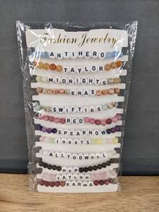 lot 53 image: Brand New Taylor Swift Music Themed Beaded Friendship Bracelets 12 Total N