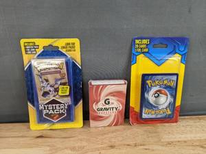 lot 10E image: 3 Brand New Pokemon Card Packs - Booster Mystery Pack, 20-Card Pack, and Gravity Boosters Pack N