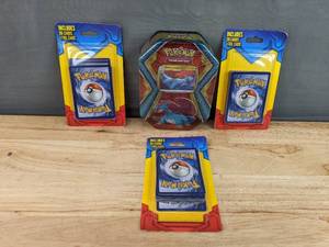 lot 26E image: 4 Brand New Pokemon Card Decks - Dragon Tin, 20-Card Packs N