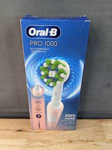 lot 4E image: New Oral-B Pro 1000 Rechargeable Electric Toothbrush N