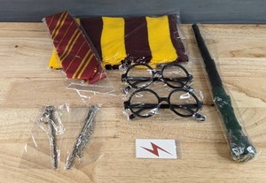 lot 266 image: Brand New Wizard Cosplay Party Supplies 2 Pairs of Wizard Glasses, Magic Wand, Tie, Scarf, Etc. N