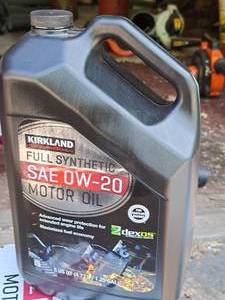 lot 60 image: Lot of (2 Bottles) Kirkland SAE 0W-20 Full Synthetic Motor Oil Quart Plastic Jugs 5-quart bottles (10 total quarts)