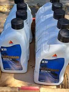 lot 64 image: Lot of (9) Citgo Safeguard SAE 30 Motor Oil Quart Plastic Bottles