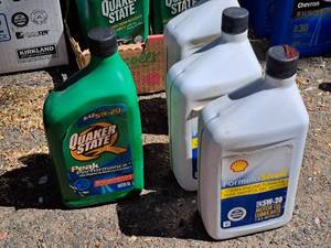 lot 67 image: Lot of (4) SAE 5W-20 Motor Oil Quart Plastic Bottles