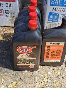 lot 68 image: Lot of (5) SAE 5W-30 Motor Oil Quart Plastic Bottles