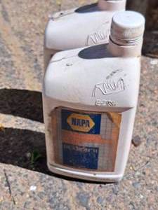 lot 71 image: Lot of (2) NAPA Dexron II Automatic Transmission Fluid Quart Plastic Bottles