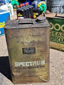lot 75 image: Vintage Sears Spectrum 10-Quart Metal 10W-30 Motor Oil Can (empty)