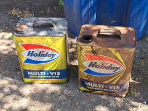 lot 76 image: Lot of (2) Holiday Multi-Vis Super Blend 2-Gallon Motor Oil Can (empty)