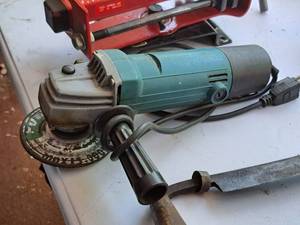lot 128 image: American Forge Pro 4-12 Angle Grinder S1M-115MM