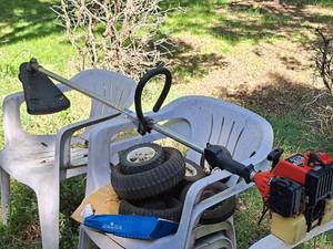 lot 139 image: Homelite Gasoline-Powered Line Trimmer ST-275 (Red)