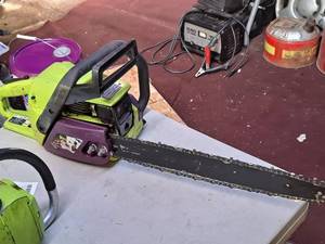 lot 50 image: Poulan 50th Anniversary Gasoline-Powered Chainsaw 18 Bar 2175 (GreenPurple)