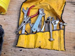 lot 321 image: Lot of (12) Assorted Hand Tools - Adjustable Wrenches, Pliers, Screwdrivers, Assorted Wrenches with Tool Pouch