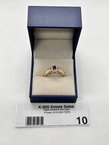 lot 10 image: Gold Ring with Red Stone and Clear Accents
