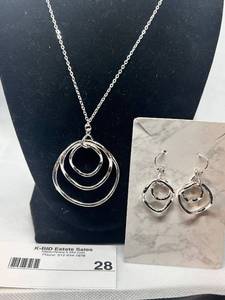 lot 28 image: Silver-Toned Necklace and Earring Set with Circular Pendant Design