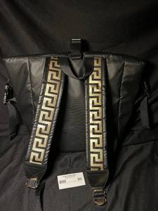lot 90 image: Versace Parfums Black Nylon Backpack