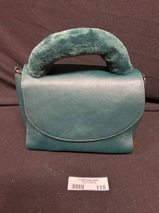 lot 115 image: Stylish Teal Handbag with Faux Fur Handle