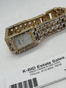 lot 117 image: AK Anne Klein Womens Gold-Tone Bracelet Watch with Crystal Accents