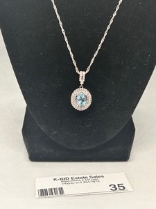 lot 35 image: Elegant Silver Necklace with Blue Gemstone Pendant